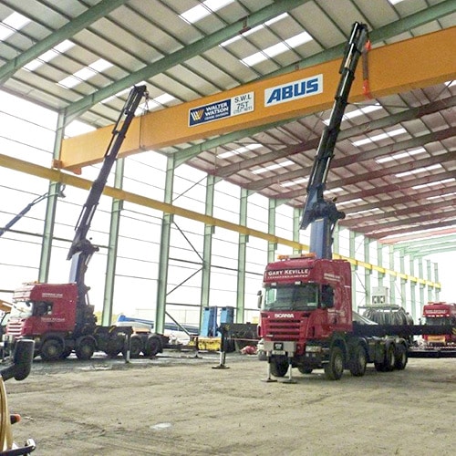 2 Crane Equipped trucks install a giant ABUS crane